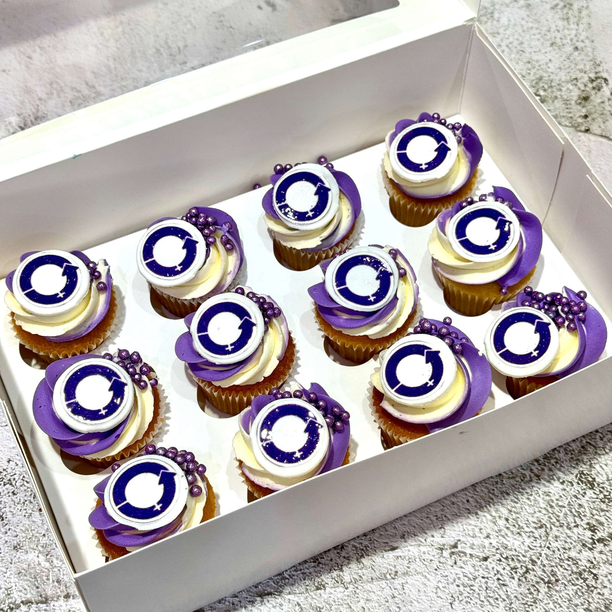 Mini cupcakes decorated for International Women’s Day celebration
