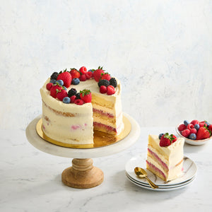 Award-winning Victoria sponge cake with fresh cream and raspberry coulis Bakealicious Sydney