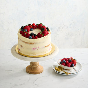 Award-winning Victoria sponge cake with fresh cream and raspberry coulis Bakealicious Sydney