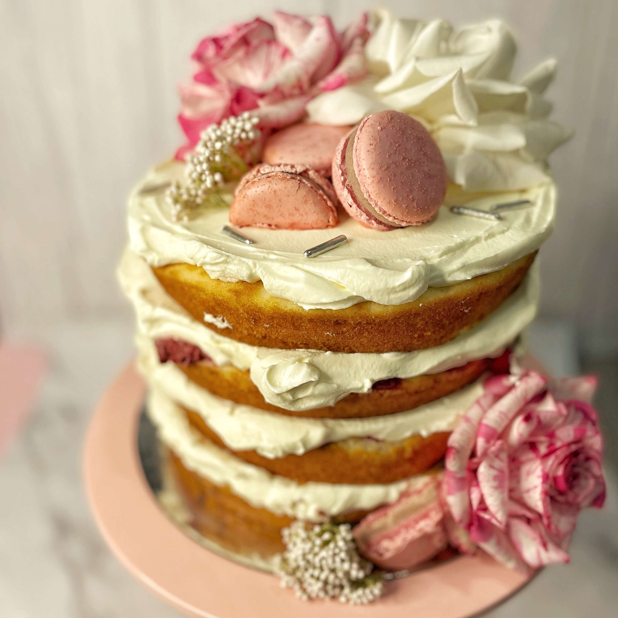 Naked Victoria Sponge Cake with fresh flowers