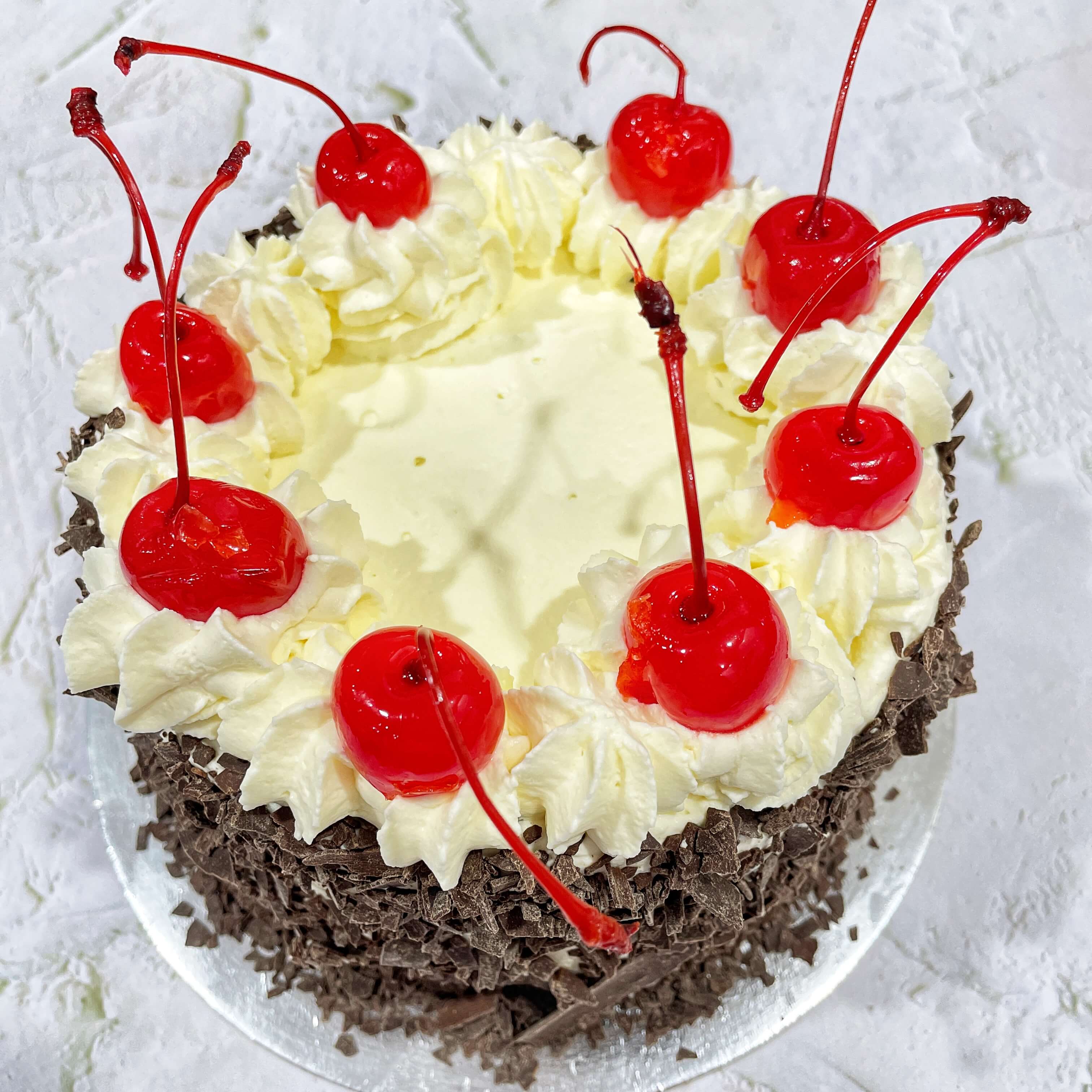 Black Forest Cake: Chocolate Sponge with Cream and Cherries – Simmering  Starfruit